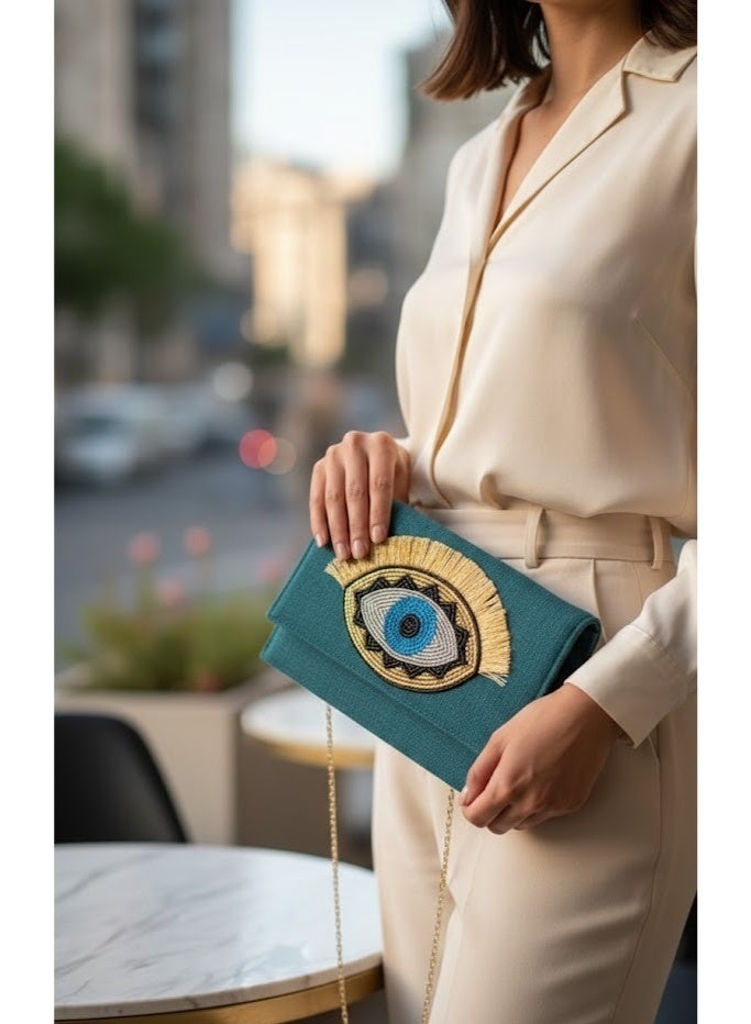 zoba Elegant women's wallet bag with a gold chain - can be worn crossbody or clutch - distinctive and luxurious eye design for outings and occasions (Turquoise) - Image 1
